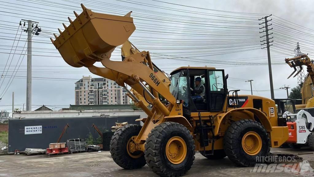 CAT 966 لوادر بعجل