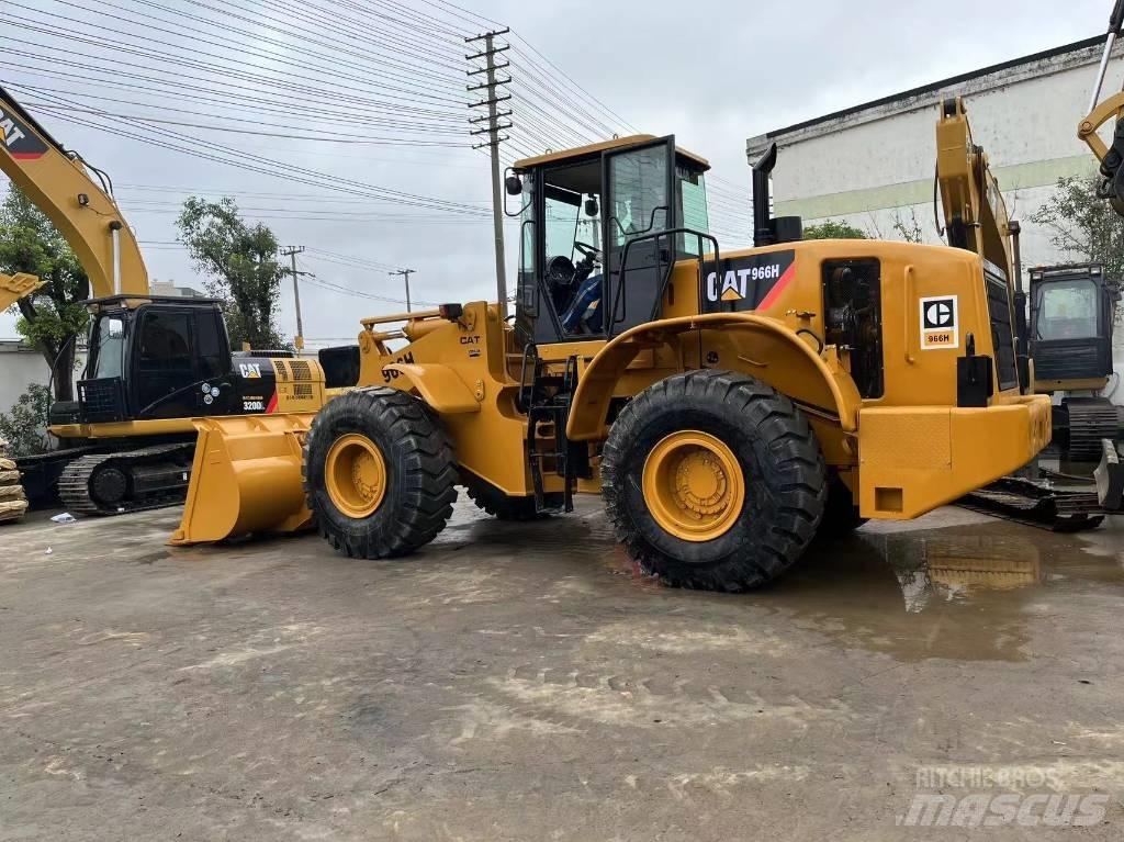 CAT 966 لوادر بعجل