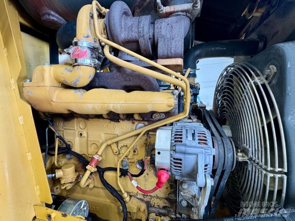 CAT 432 D لوادر ذات جرافات عكسية