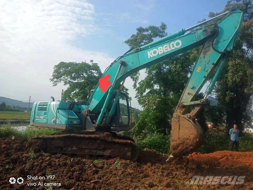 Kobelco SK 210 حفارات زحافة