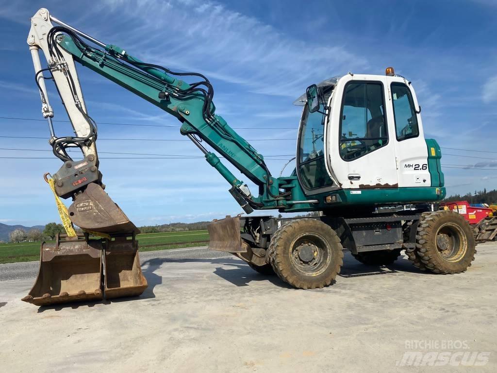 New Holland MH 2.6 حفارات بعجل