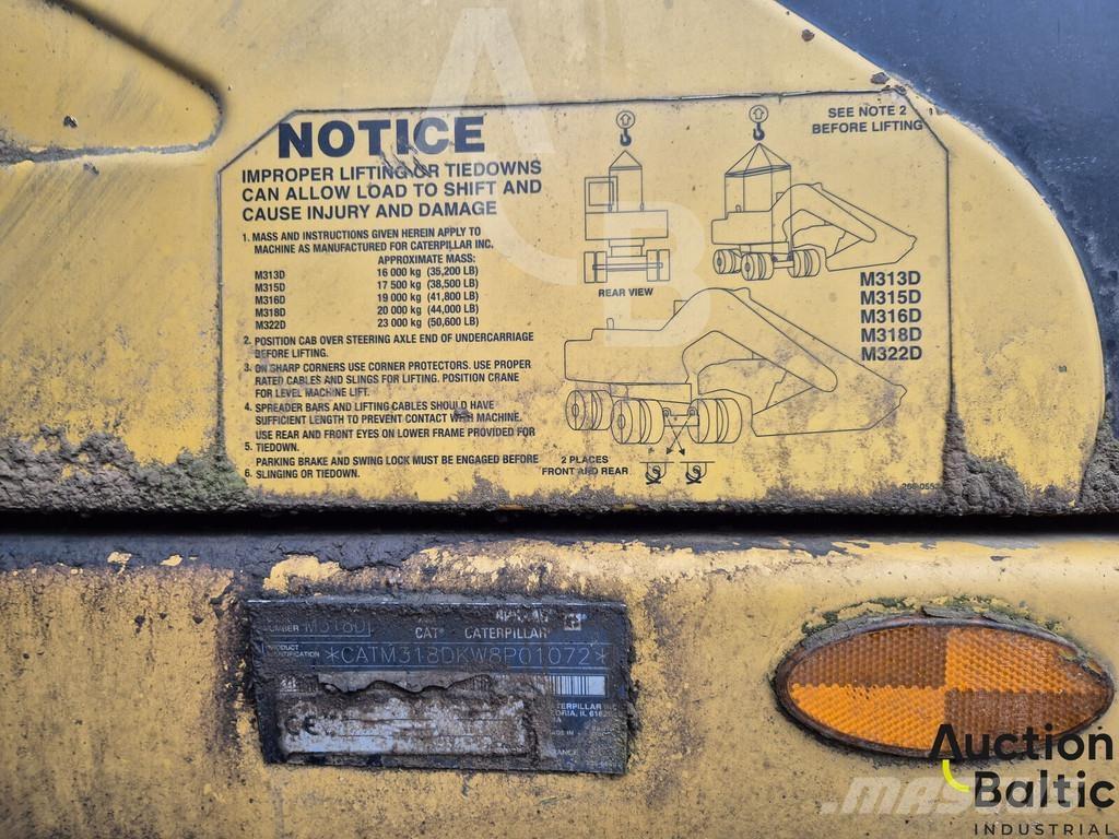 CAT M 318 D حفارات بعجل