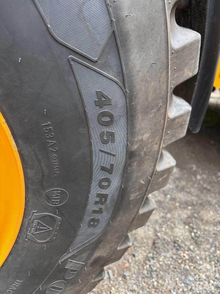 JCB 407 لوادر بعجل