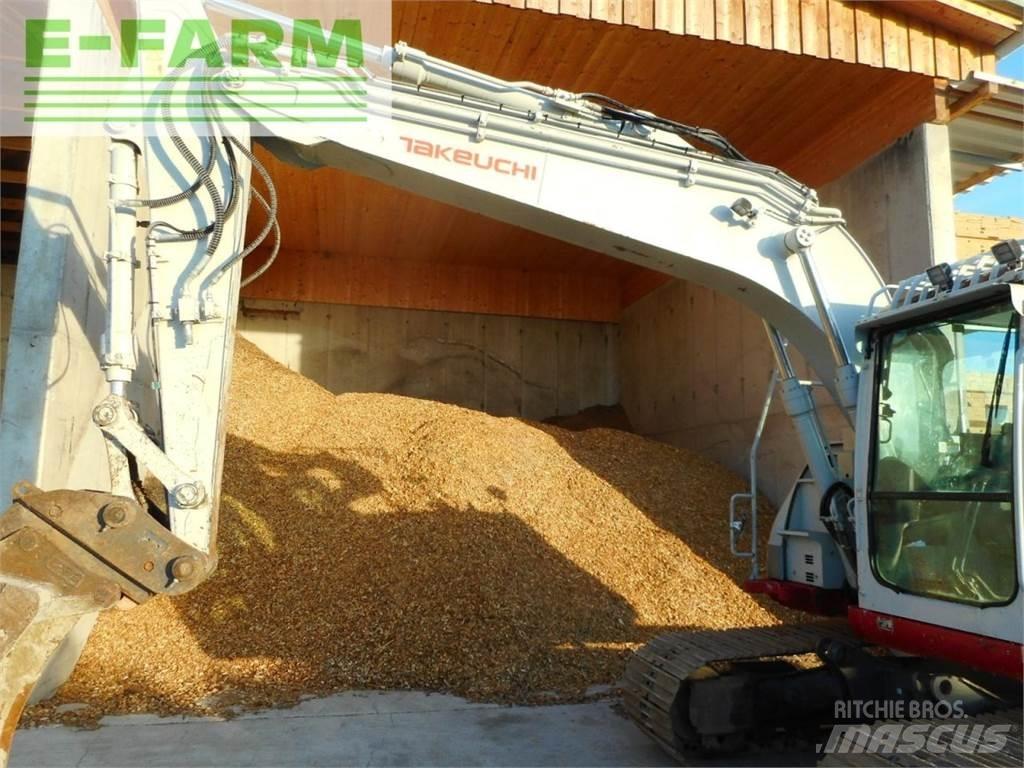 Takeuchi tb2150r حفارات بعجل