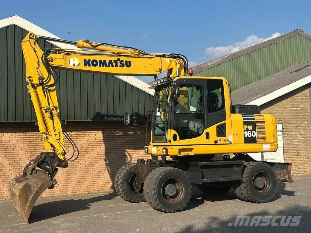 Komatsu PW160-8 حفارات بعجل