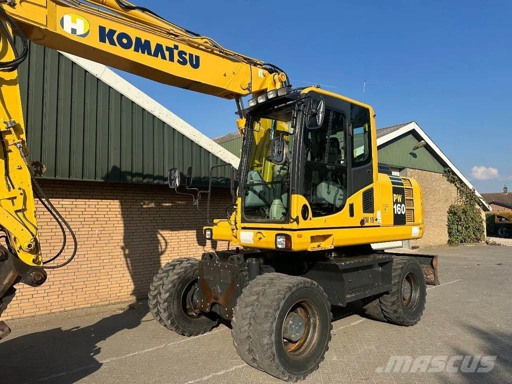 Komatsu PW160-8 حفارات بعجل