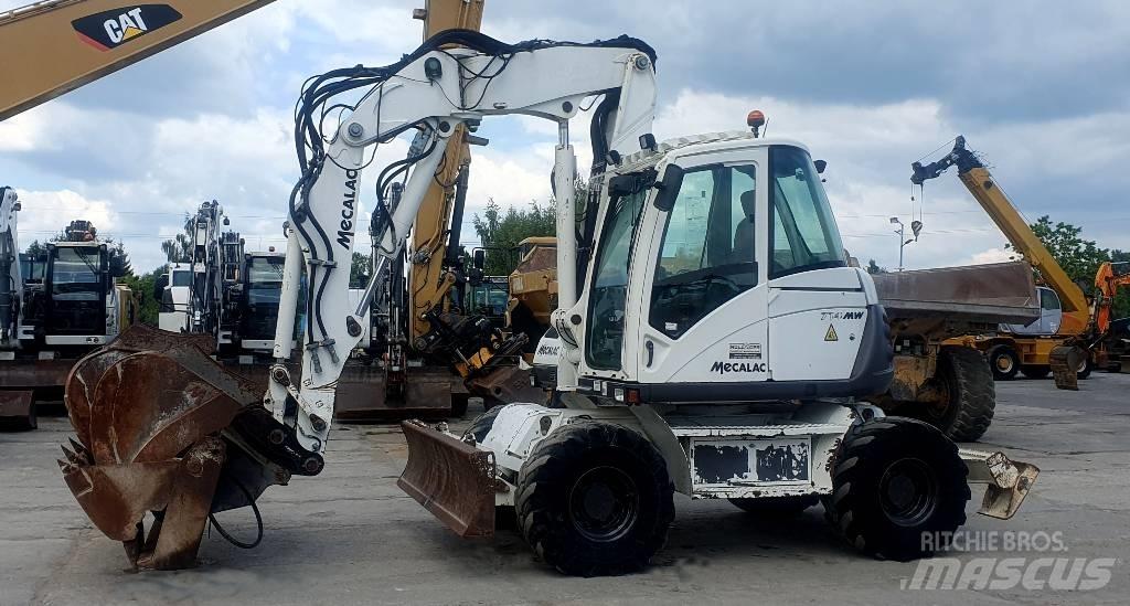 Mecalac 714 MWE حفارات بعجل