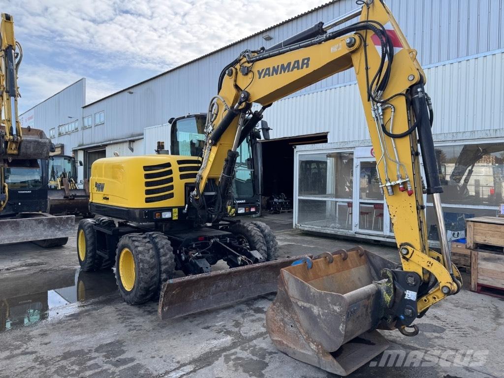 Yanmar B95W (40576) حفارات بعجل