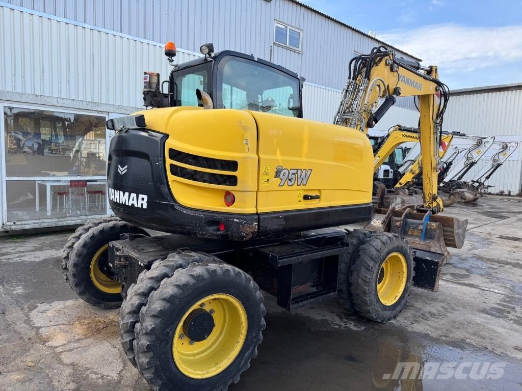 Yanmar B95W (40576) حفارات بعجل