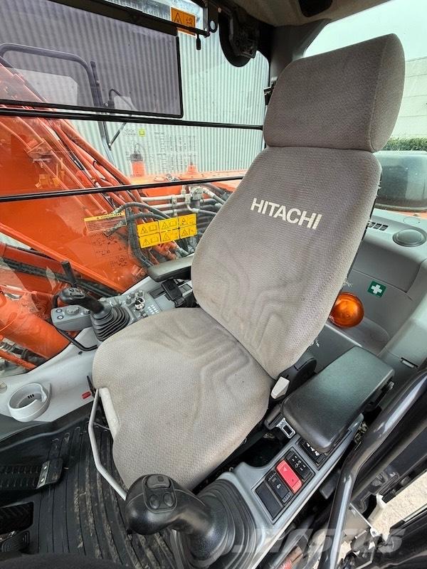 Hitachi ZX 140 W-5 حفارات بعجل