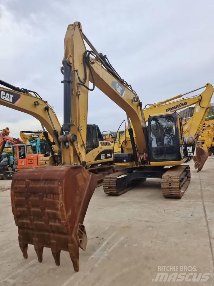 CAT 313 D حفارات زحافة