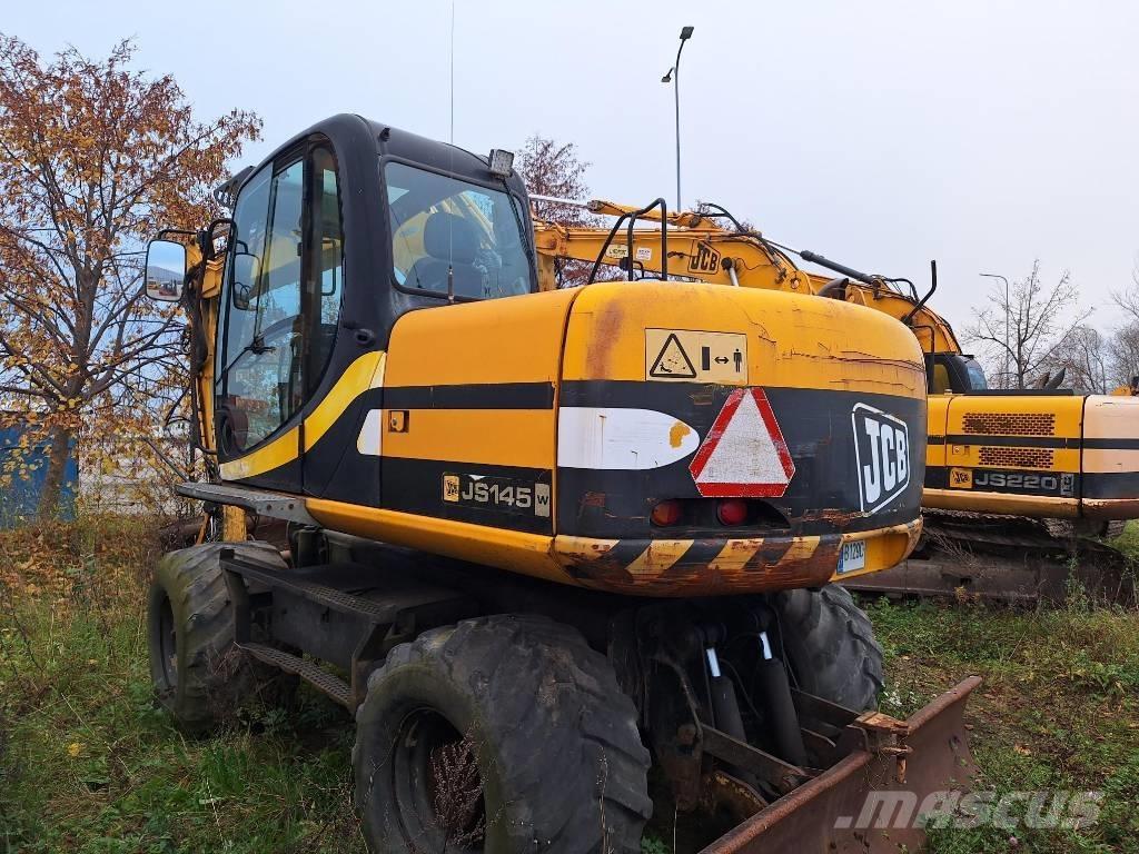 JCB JS 145 W حفارات بعجل