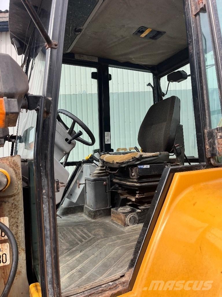 Massey Ferguson 860 لوادر ذات جرافات عكسية