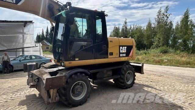 CAT 316 D حفارات بعجل
