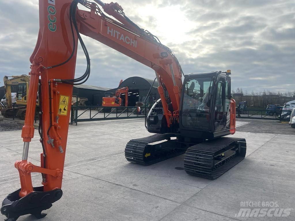 Hitachi ZX 135 US-6 حفارات زحافة