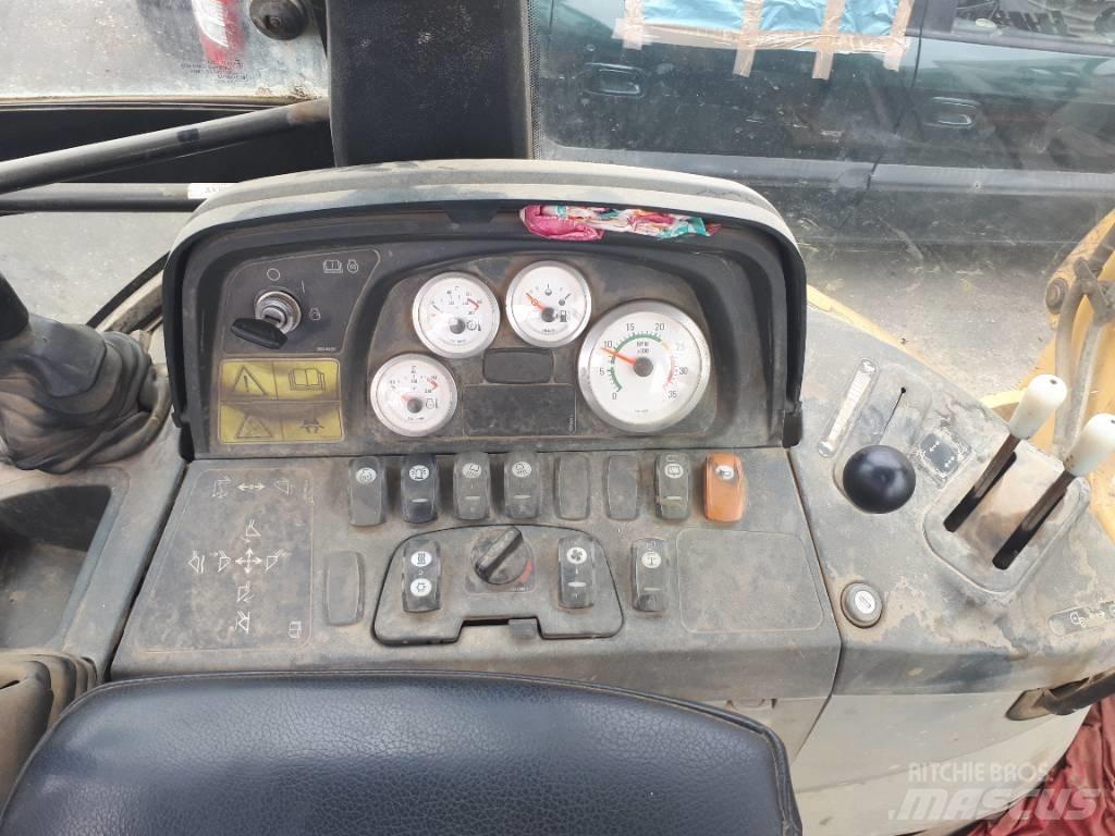 CAT 428 D لوادر ذات جرافات عكسية