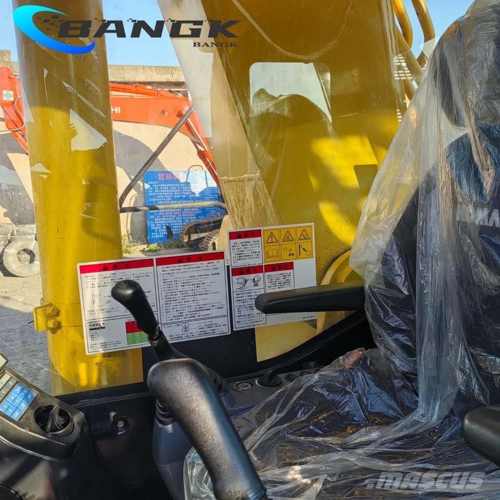 Komatsu pc450 حفارات زحافة