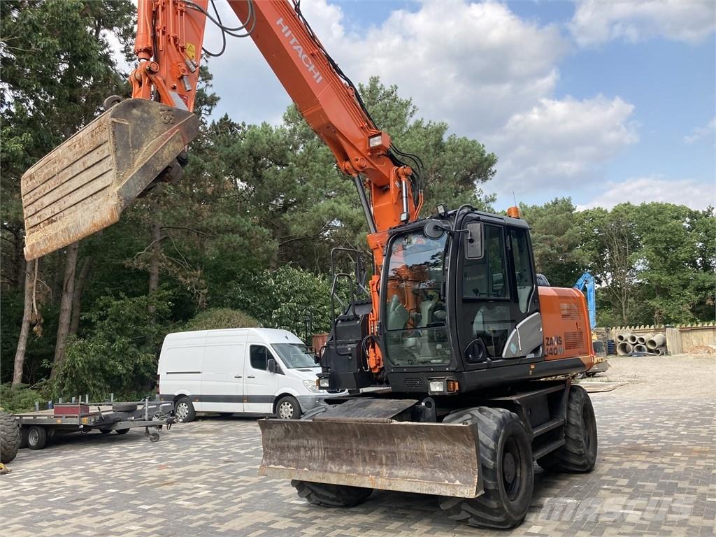 Hitachi ZX 140 W-5 حفارات بعجل