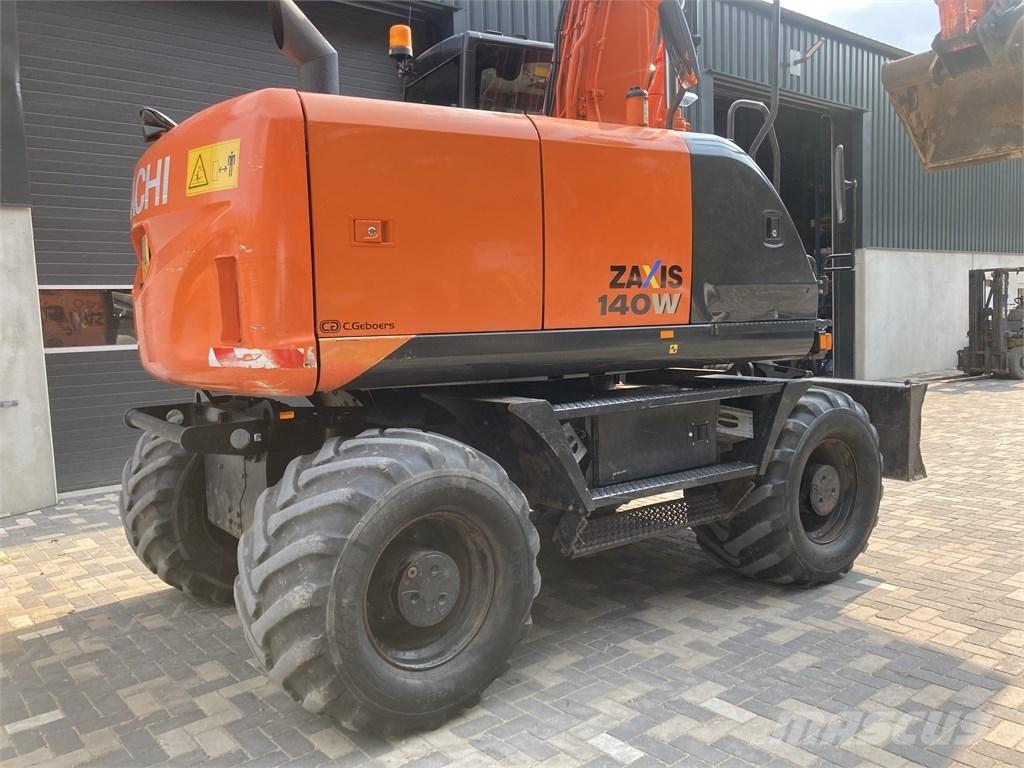Hitachi ZX 140 W-5 حفارات بعجل