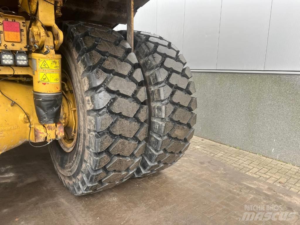 CAT 775 G شاحنات المخلفات الصلبة