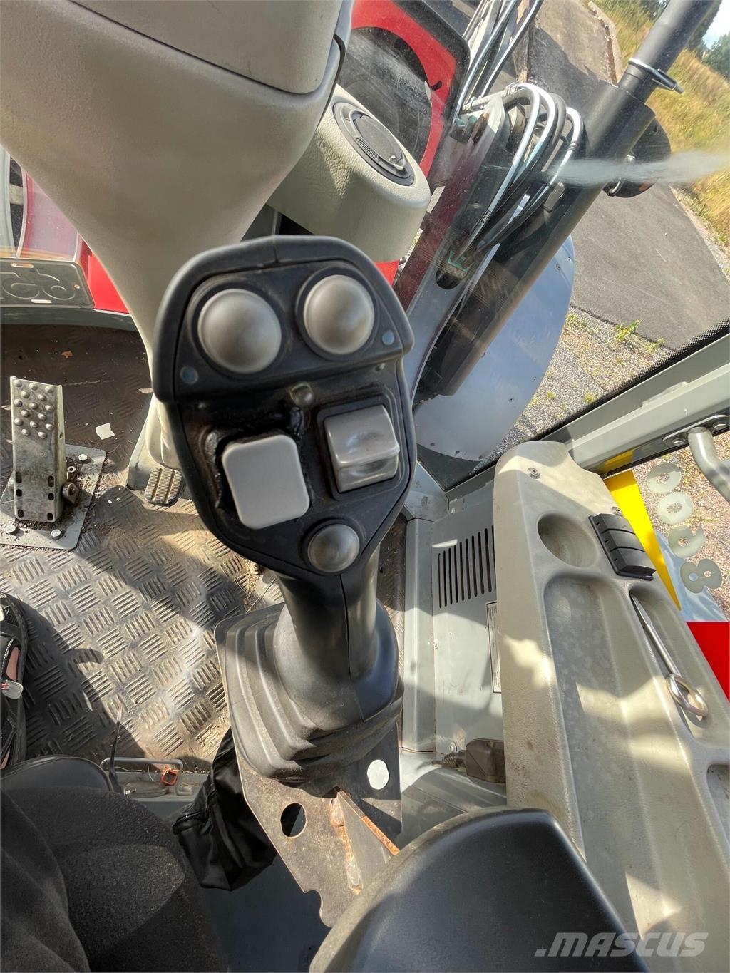 Lännen 8600 E لوادر ذات جرافات عكسية