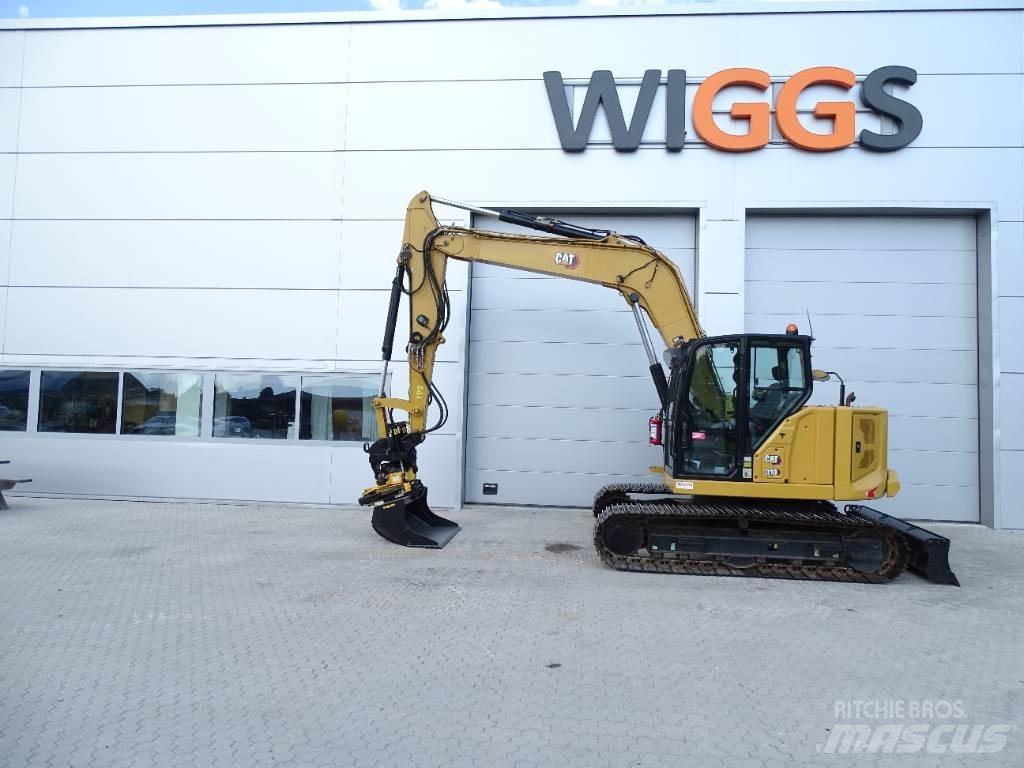 CAT 310 حفارات وسط 7 طن - 12 طن