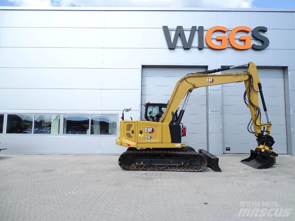 CAT 310 حفارات وسط 7 طن - 12 طن