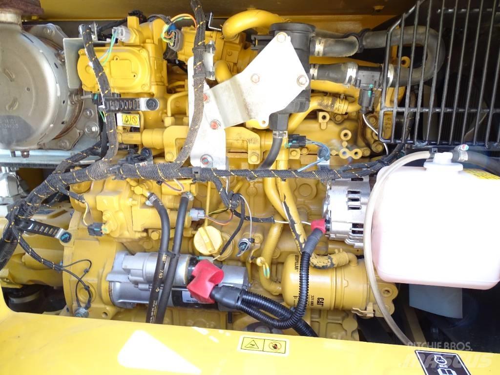 CAT 310 حفارات وسط 7 طن - 12 طن
