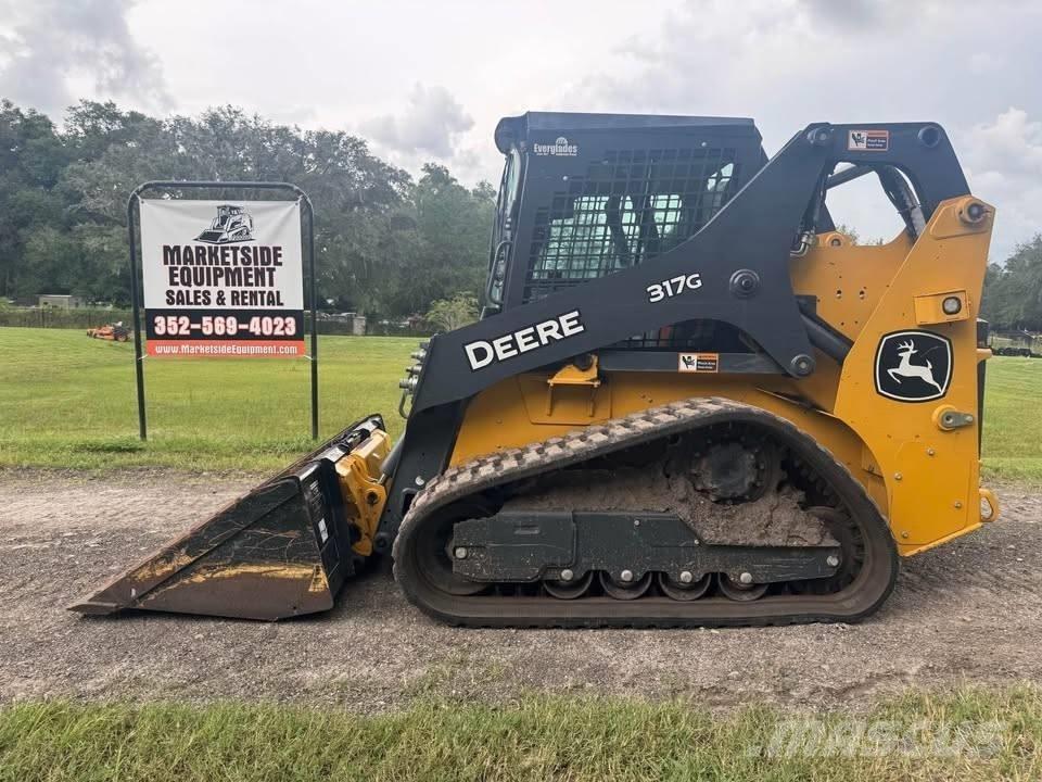 John Deere 317 لوادر انزلاقية التوجيه