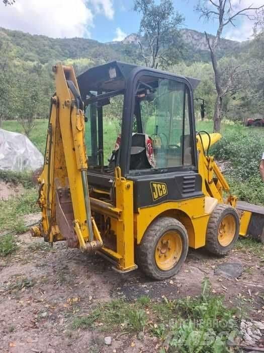 JCB 1 CX لوادر ذات جرافات عكسية
