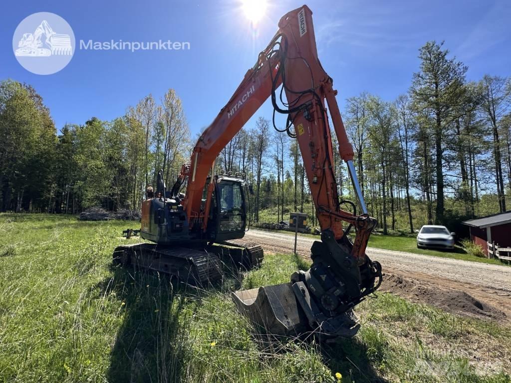 Hitachi ZX 135 US-6 حفارات زحافة