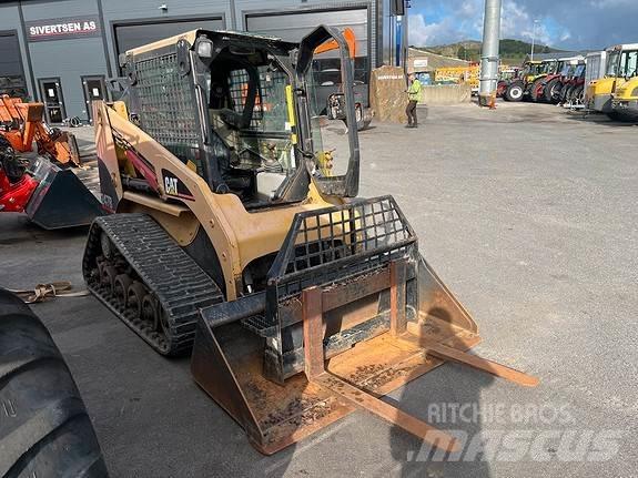 CAT 274B لوادر انزلاقية التوجيه