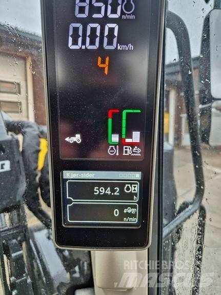 John Deere 6100M الجرارات