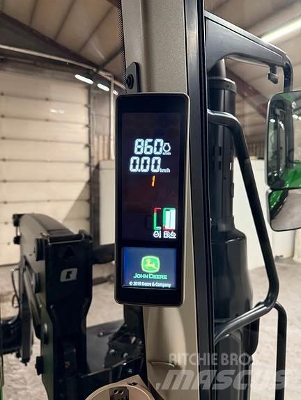 John Deere 6100M الجرارات
