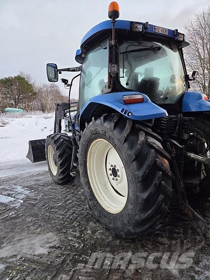 New Holland T6020 الجرارات
