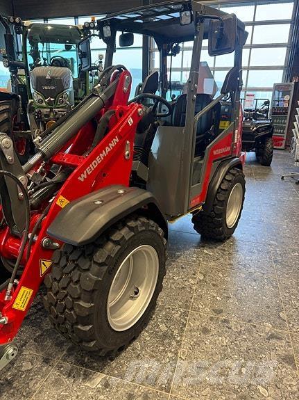 Weidemann 1260LP لوادر انزلاقية التوجيه
