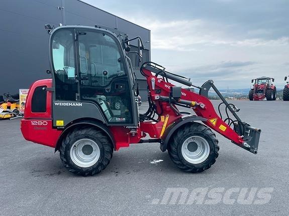 Weidemann 1280 لوادر انزلاقية التوجيه