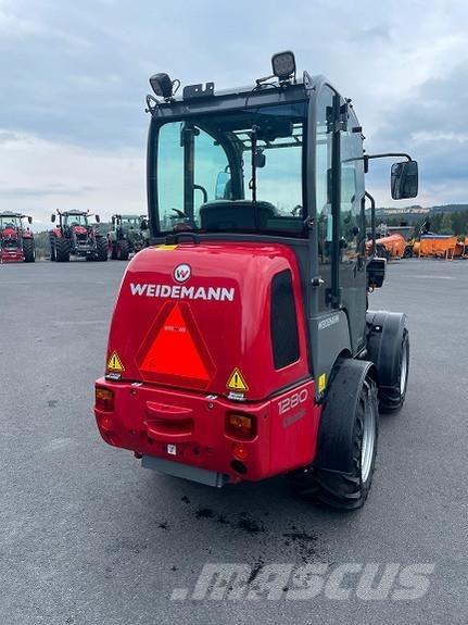Weidemann 1280 لوادر انزلاقية التوجيه