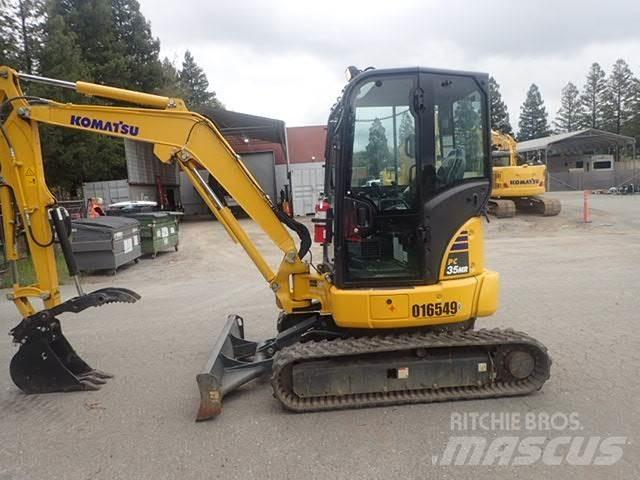 Komatsu PC35MR-5 +1 حفارات زحافة