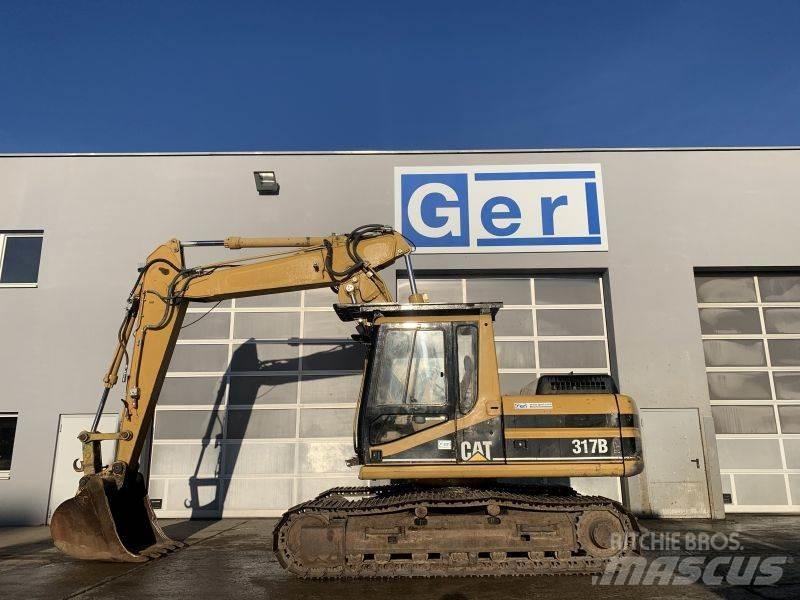 CAT 317 B حفارات زحافة
