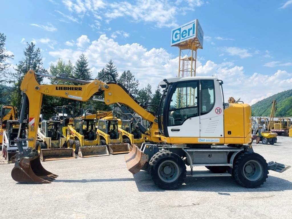 Liebherr A910 Compact حفارات بعجل