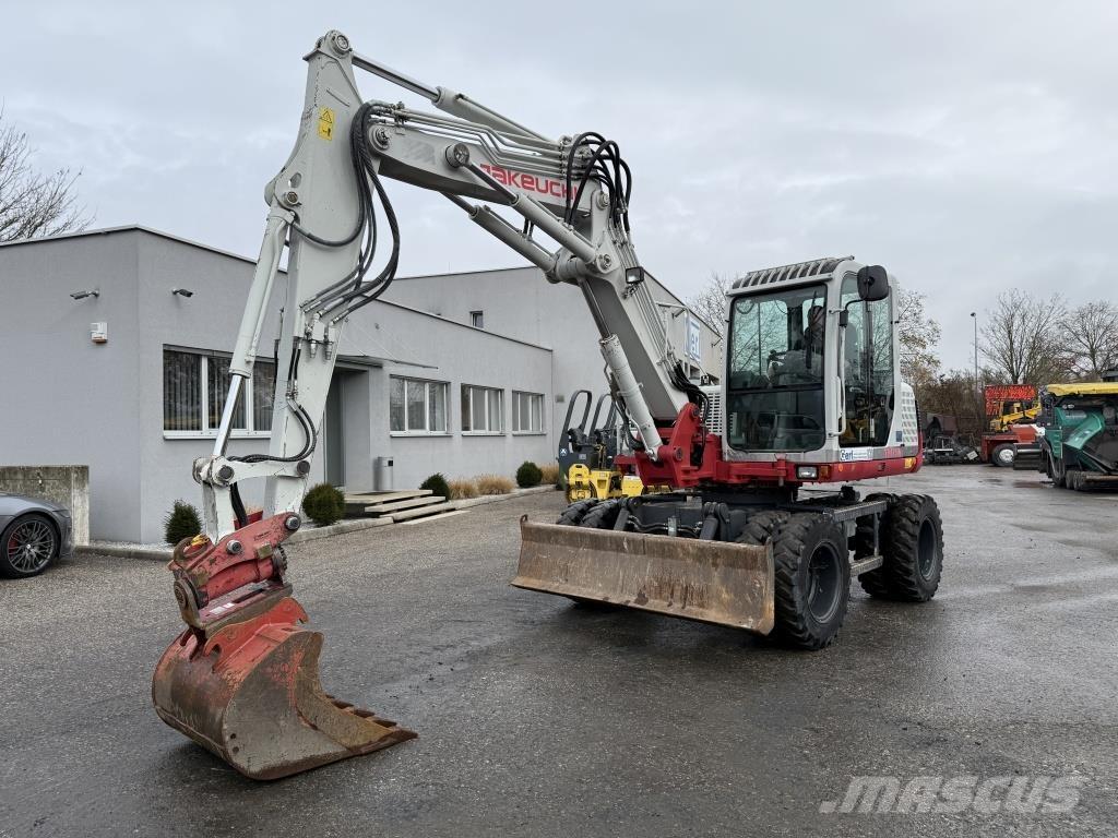 Takeuchi TB 175 W حفارات بعجل