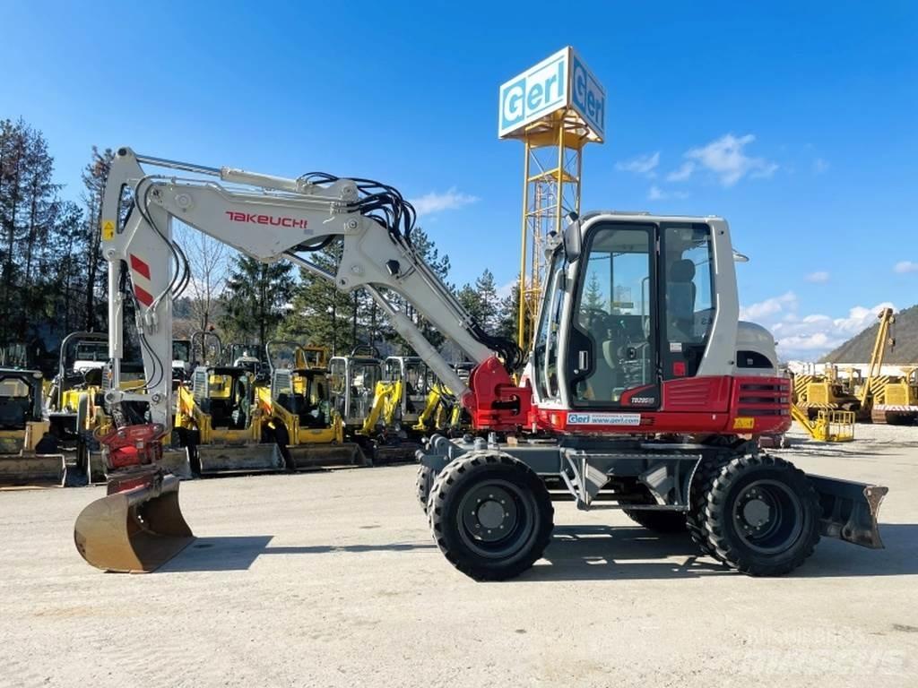 Takeuchi TB295W حفارات بعجل