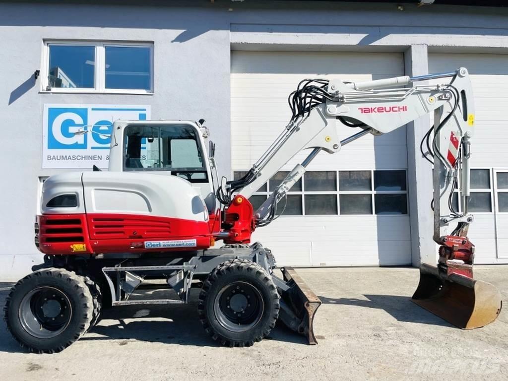 Takeuchi TB295W حفارات بعجل