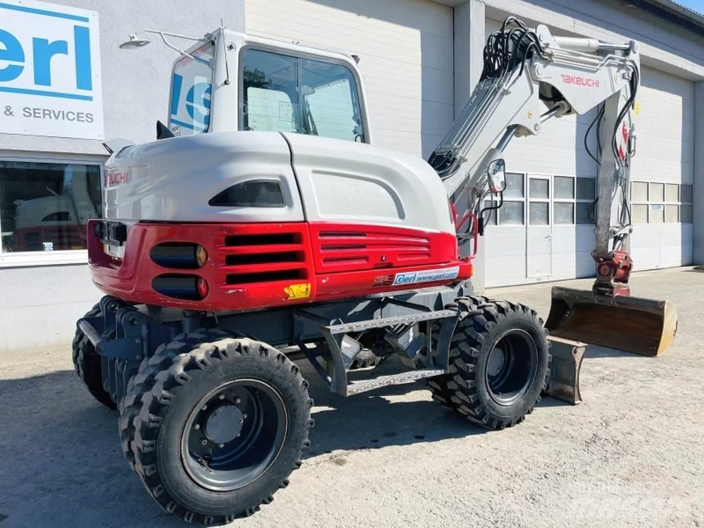 Takeuchi TB295W حفارات بعجل