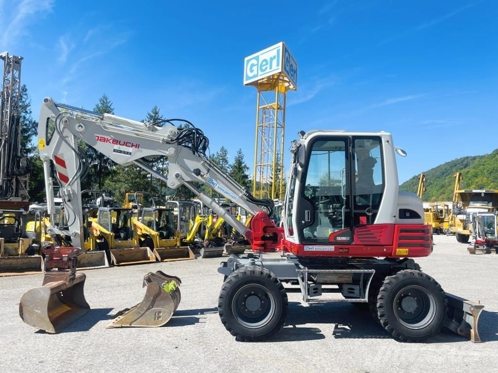 Takeuchi TB295W حفارات بعجل