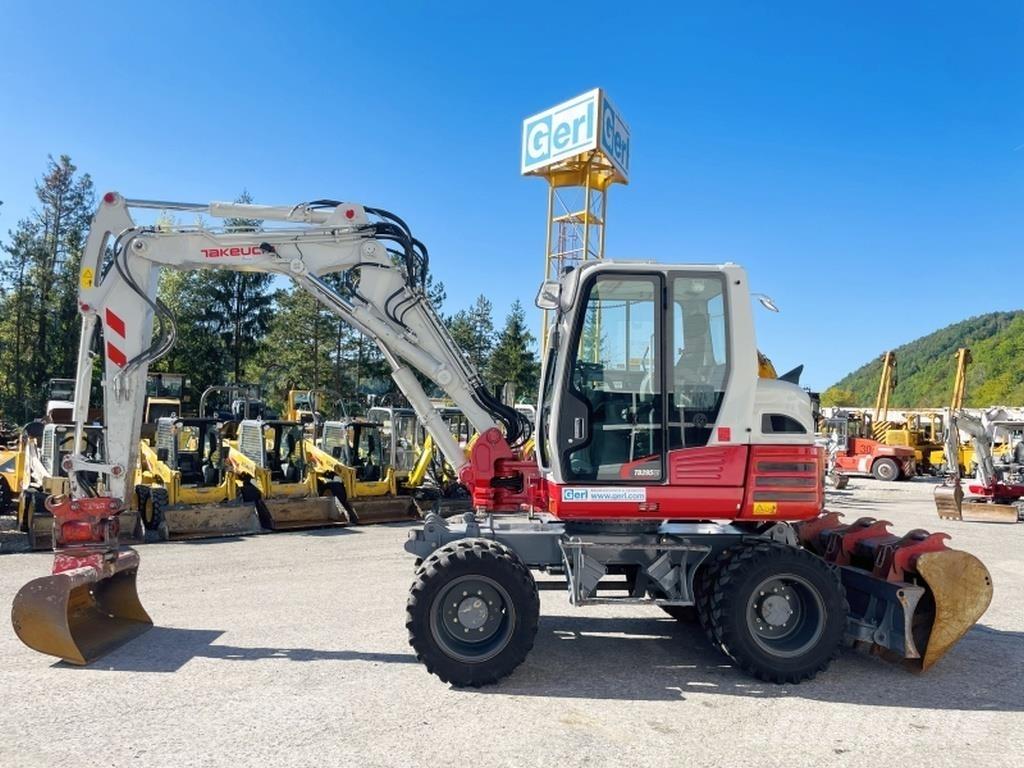 Takeuchi TB295W حفارات بعجل