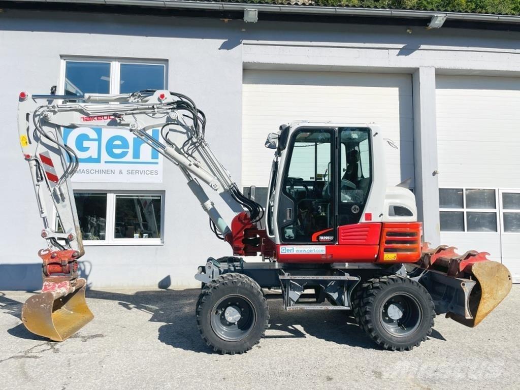 Takeuchi TB295W حفارات بعجل