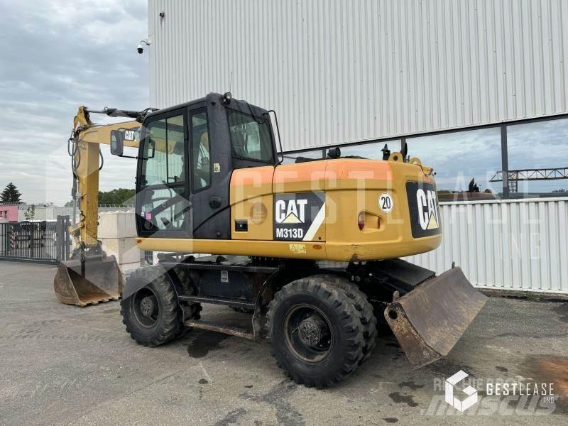 CAT M313D حفارات بعجل