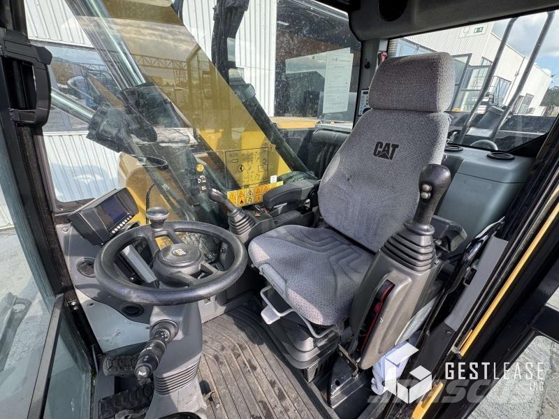 CAT M315F حفارات بعجل